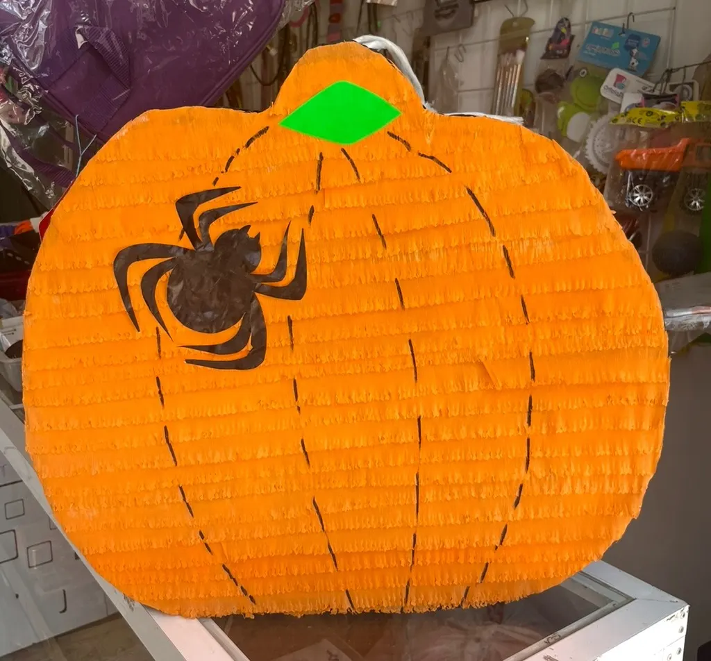 Pumpkin and spider piñata