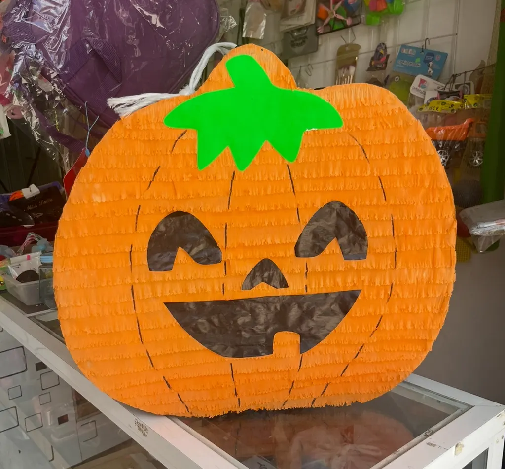 Smiling pumpkin piñata
