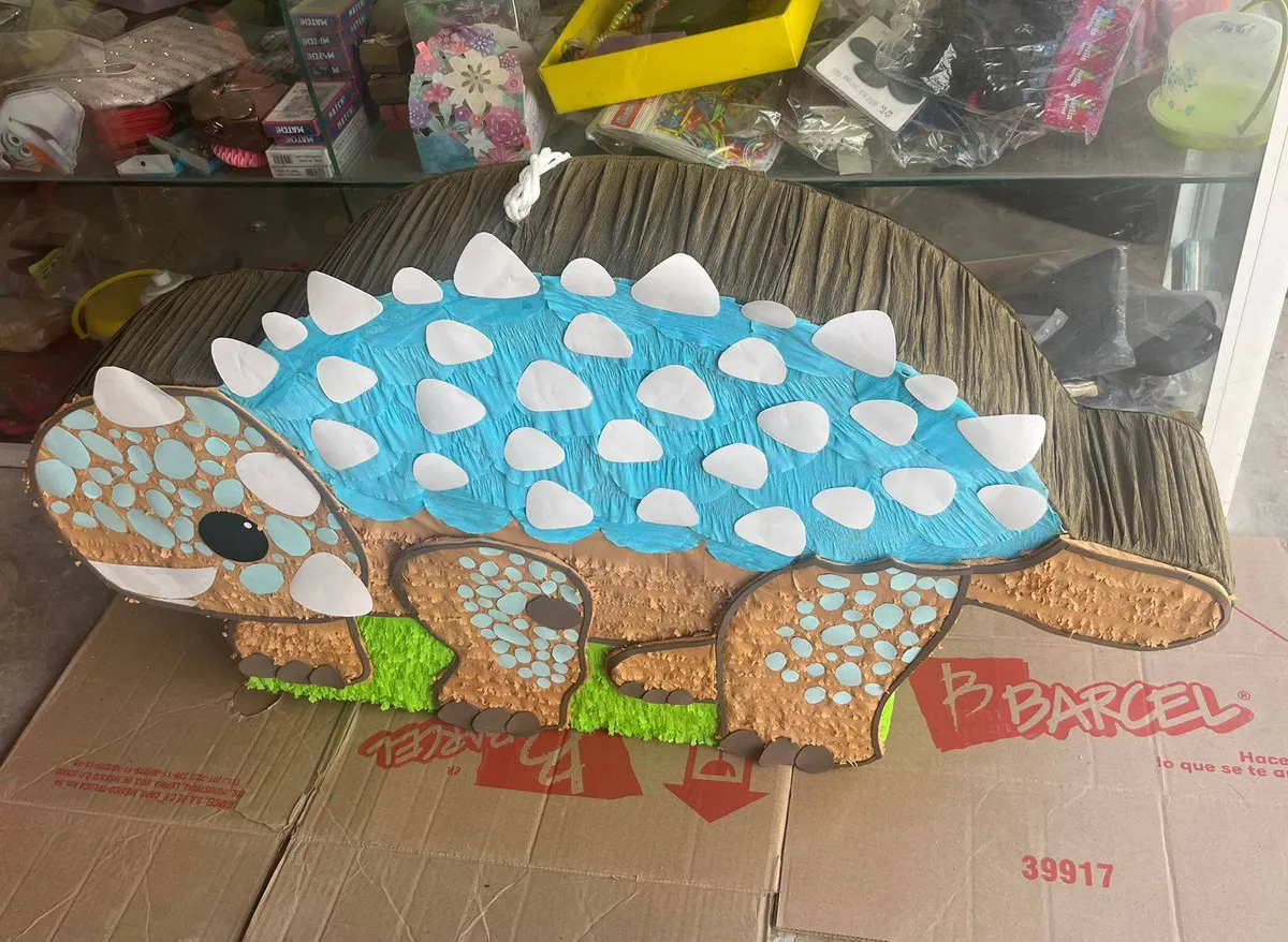 Blue dinosaur piñata