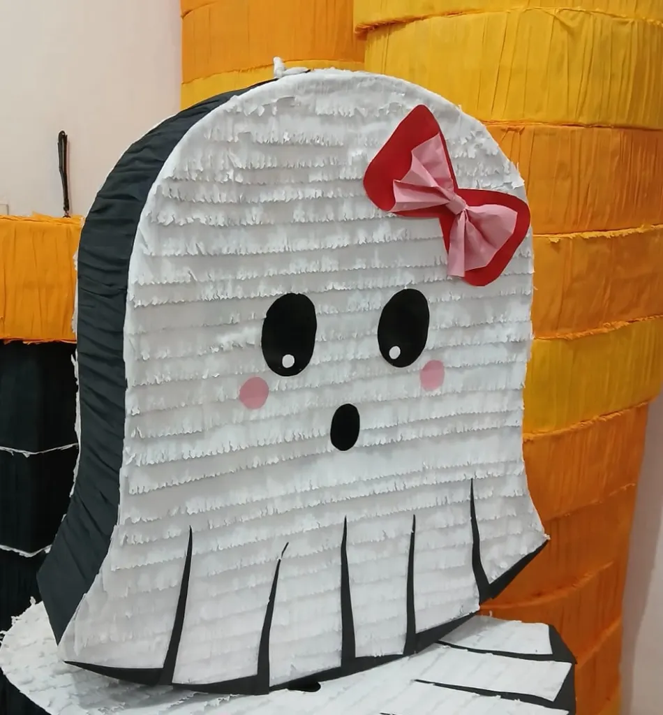 Ghost piñata with a bow