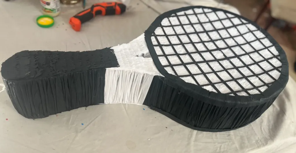 Tennis racket piñata