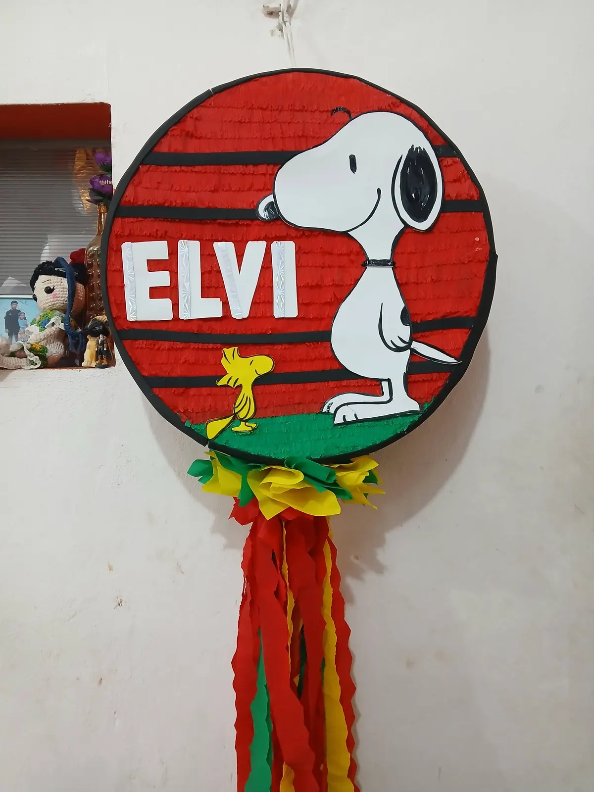 Round Snoopy piñata with a name